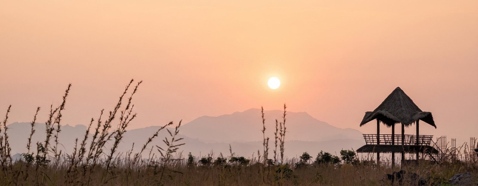 Sambrahma rolling farmland with forest views