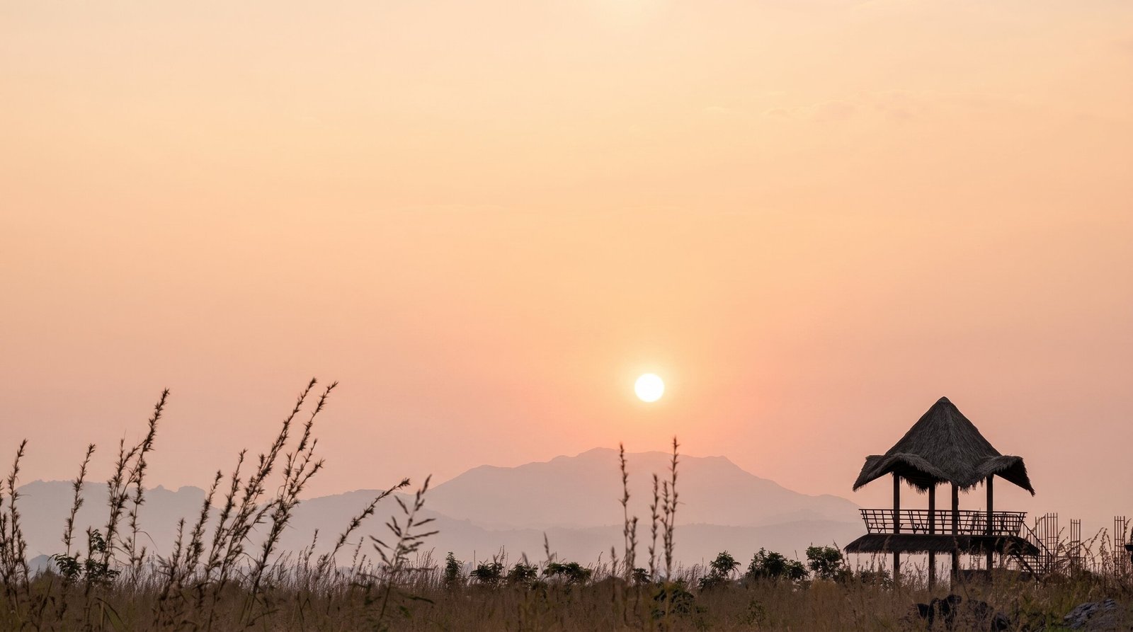Sambrahma rolling farmland with forest views