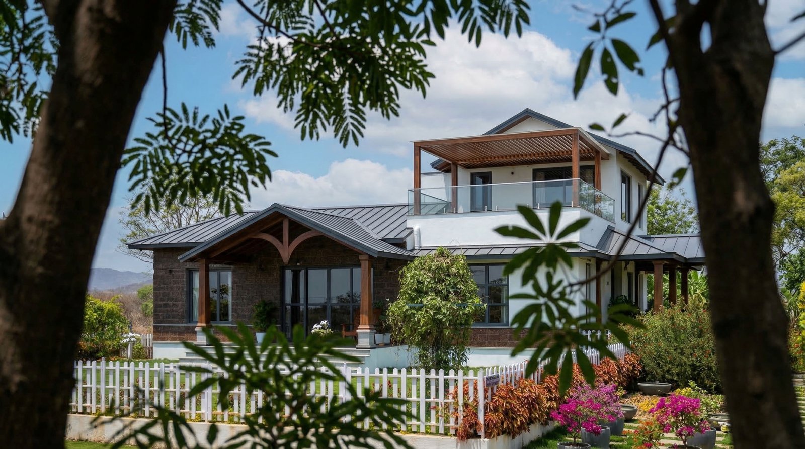 Clean-lined farmhouse with copper roof — Hosachiguru