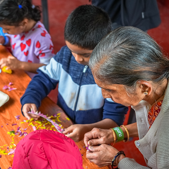 Children's Day — hands in soil at Dhaanvi