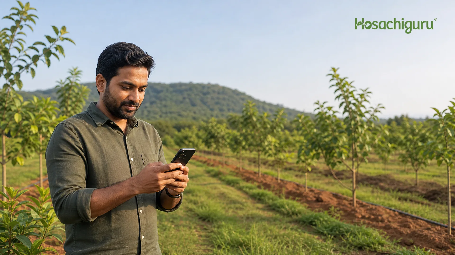 Managed farmland owner checking the MyFarm app on a phone with lush green farm plots visible behind